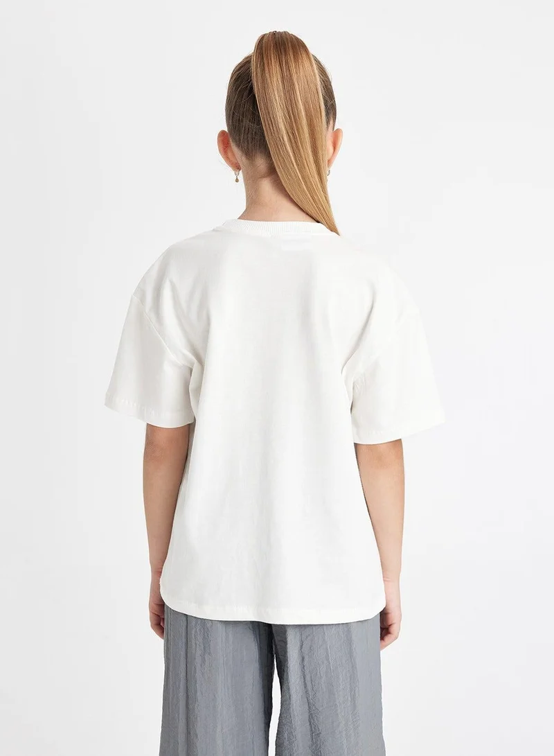 ديفاكتو تيشيرت هاري بوتر بقصة واسعة وياقة دائرية وأكمام قصيرة