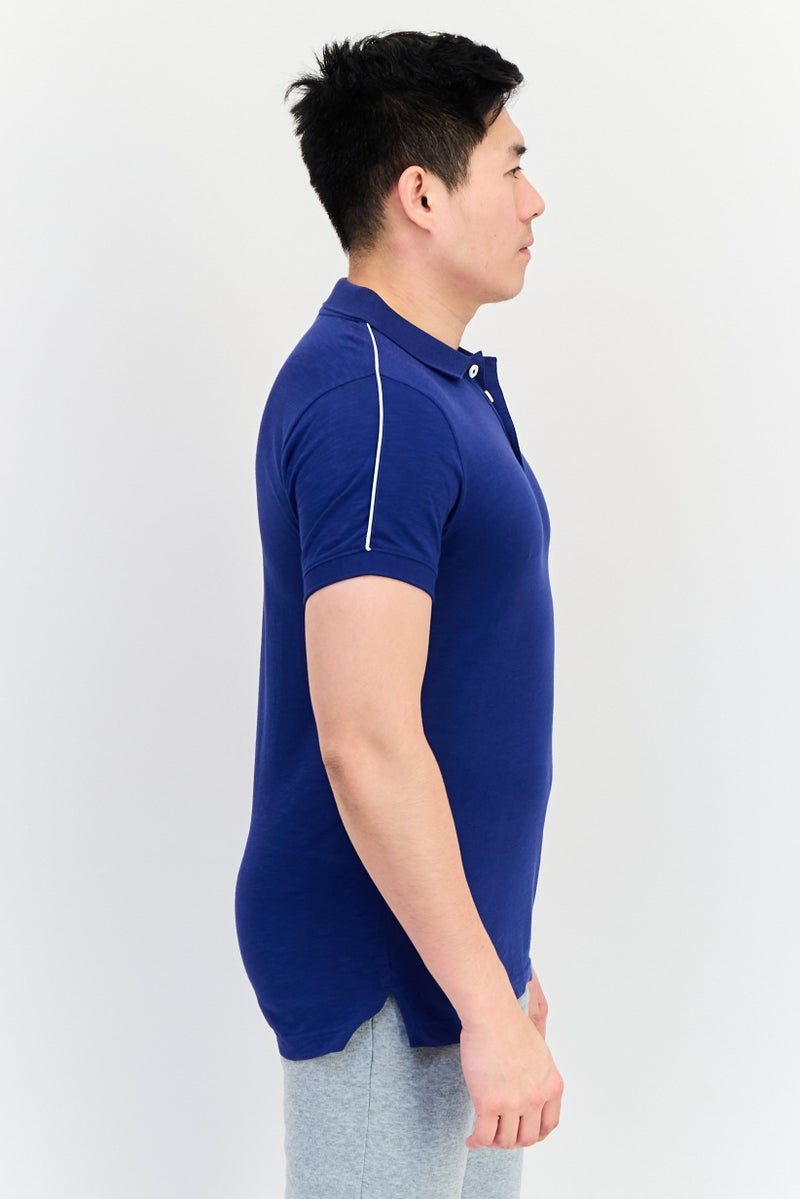 PUMA تي شيرت بولو خارجي للرجال مع شعار مطرز، لون كحلي - Image 2