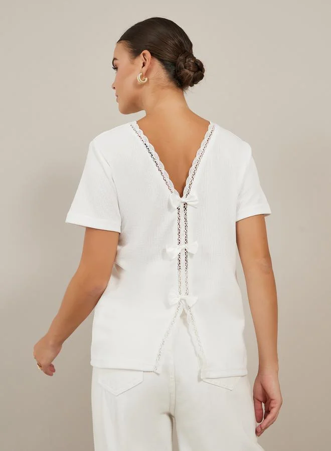 Styli Textured Round Neck Lace Detail T-Shirt with Bow Detail