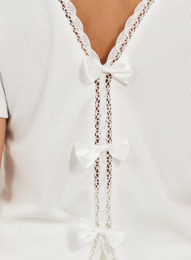 Styli Textured Round Neck Lace Detail T-Shirt with Bow Detail