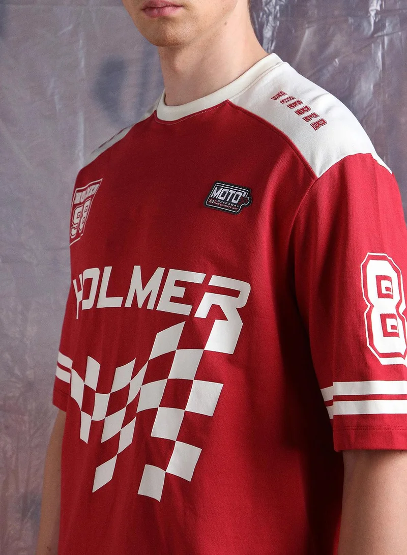 هوبرهولمي Men Moto Varsity Graphic Printed Oversized Fit T-shirt