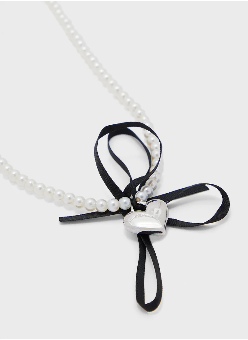 Ginger Bow Detail Heart Pendant Necklace