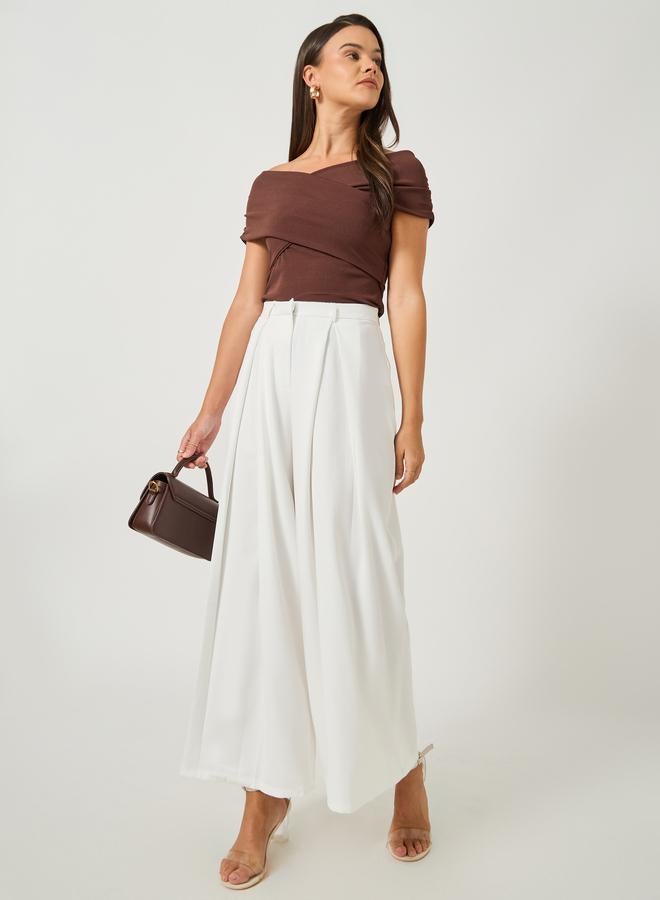 Styli Solid Inverted Pleated Wide Leg Pants - Image 1