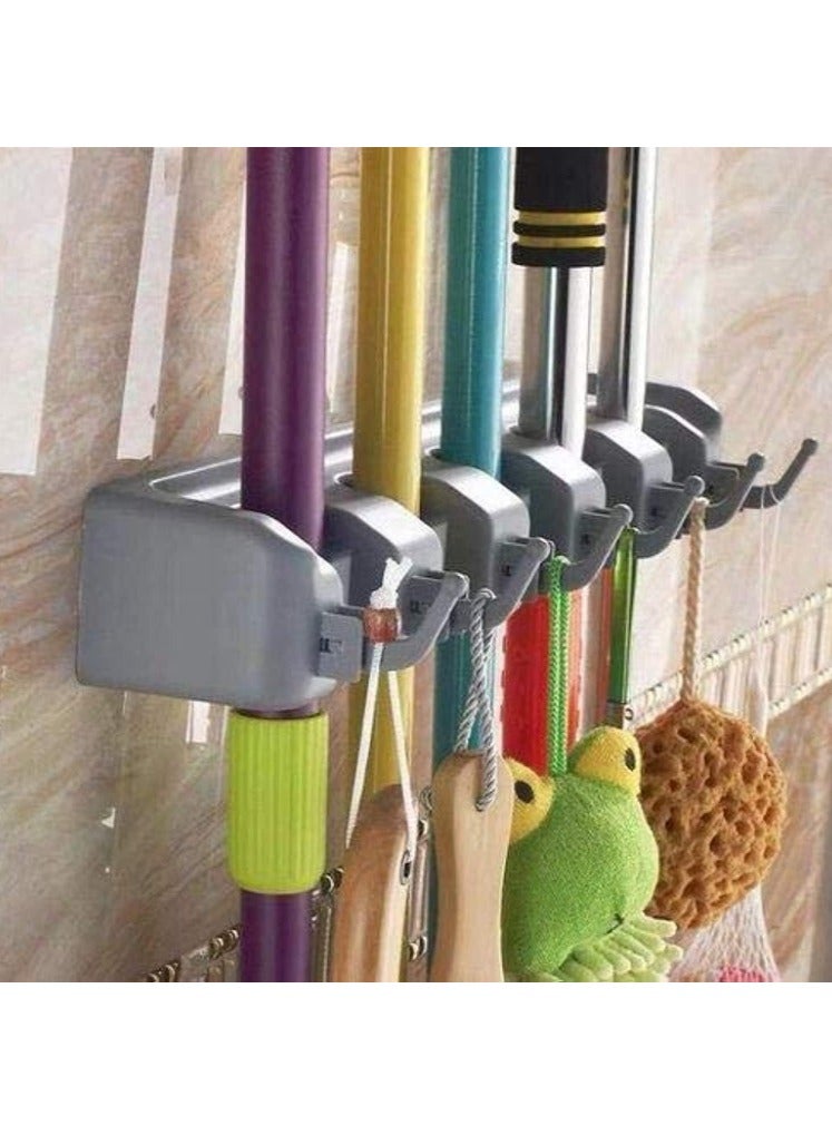Mop Holder, Broom Organizer with 5 Slots - The Perfect Solution for Organizing Cleaning Tools and Kitchen, Wall-Mounted Heavy-Duty Holder for Brooms and Mops with 5 Slots and 6 Hooks for Home, Garden, Garage, and Storage Room. Wall-Mounted Organizer for Brooms, Mops, Dusters, and Brushes, Plastic, Kitchen Organizer, Multi-Position Broom Rack, Wall-Mounted Mop Organizer, Broom Holder for Wall with 5 Slots and 6 Hooks for Home, Kitchen, and Garden Use.  - Image 1