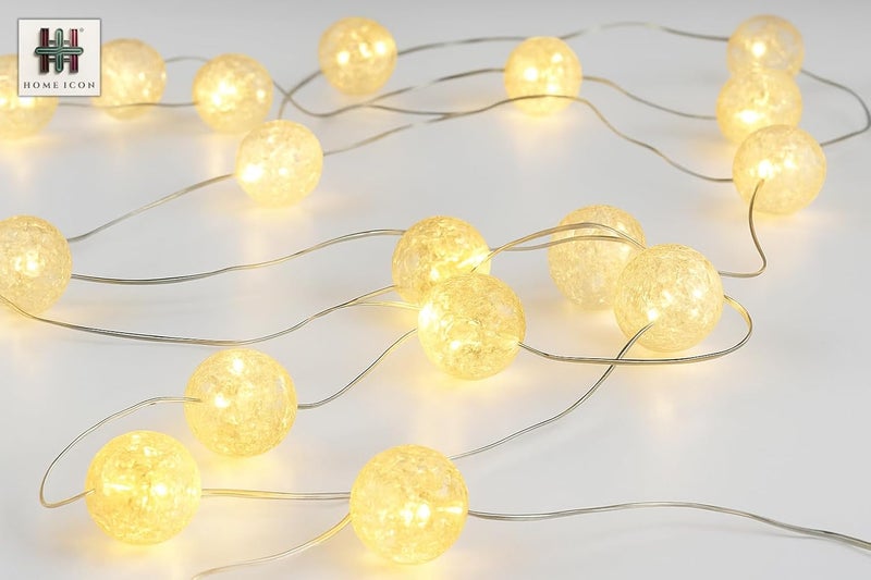 Home Icon أضواء خيطية كروية متصدعة ديكورية - 5م 50 LED أبيض ناعم تعمل بالبطارية - Image 1