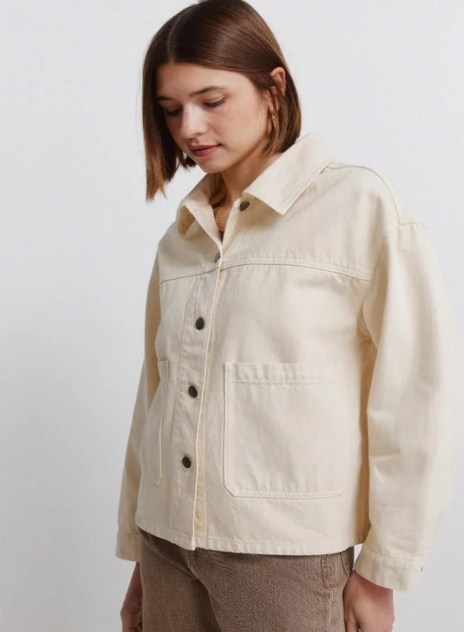 Springfield  Coloured oversized denim jacket. Shirt collar. Button fastening with placket. Front patch pockets. A wash process using new technologies has been applied, reducing water, chemical and energy consumption. for Women | Best Price UAE