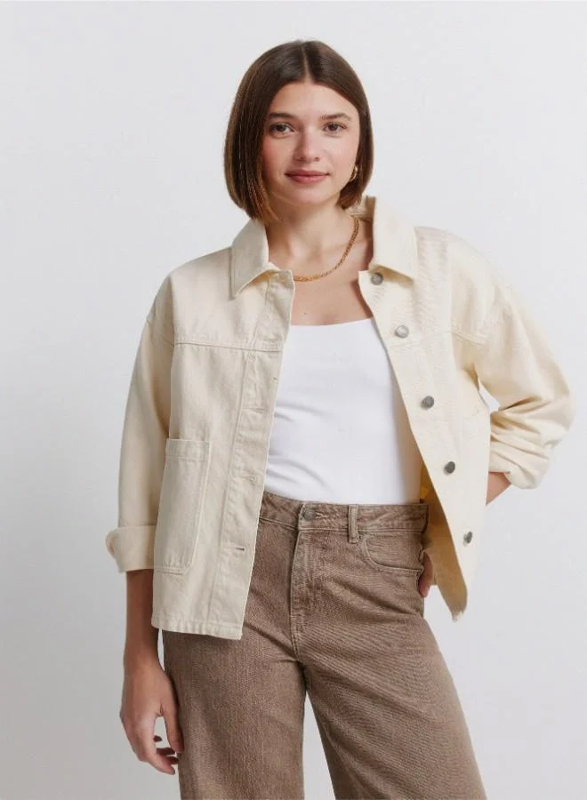 Springfield  Coloured oversized denim jacket. Shirt collar. Button fastening with placket. Front patch pockets. A wash process using new technologies has been applied, reducing water, chemical and energy consumption. for Women | Best Price UAE