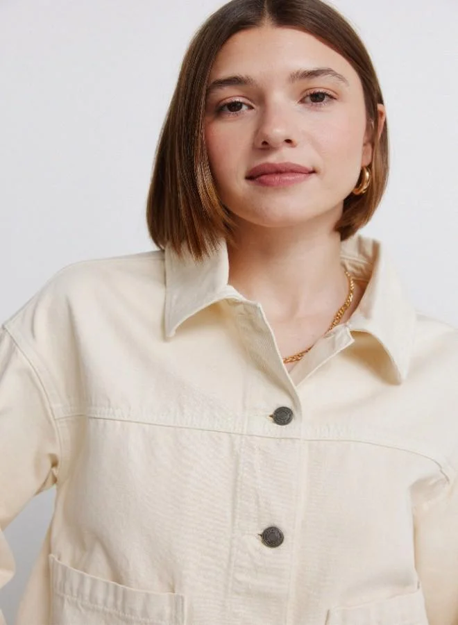 Springfield  Coloured oversized denim jacket. Shirt collar. Button fastening with placket. Front patch pockets. A wash process using new technologies has been applied, reducing water, chemical and energy consumption. for Women | Best Price UAE