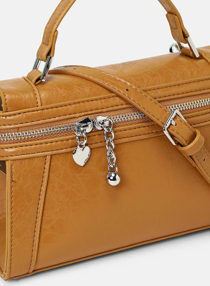 Haute Sauce Solid Zip Lock Regular Vegan Leather Sling Bag with Detachable Strap For Women