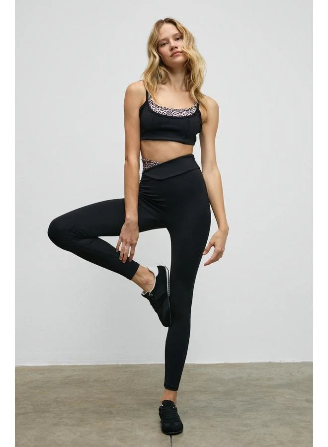 Urban Beat  JULSEN Women's Soft and Stretchy Textured Black Leggings with Asymmetric Contrast Waist Detail. for Women | Best Price UAE