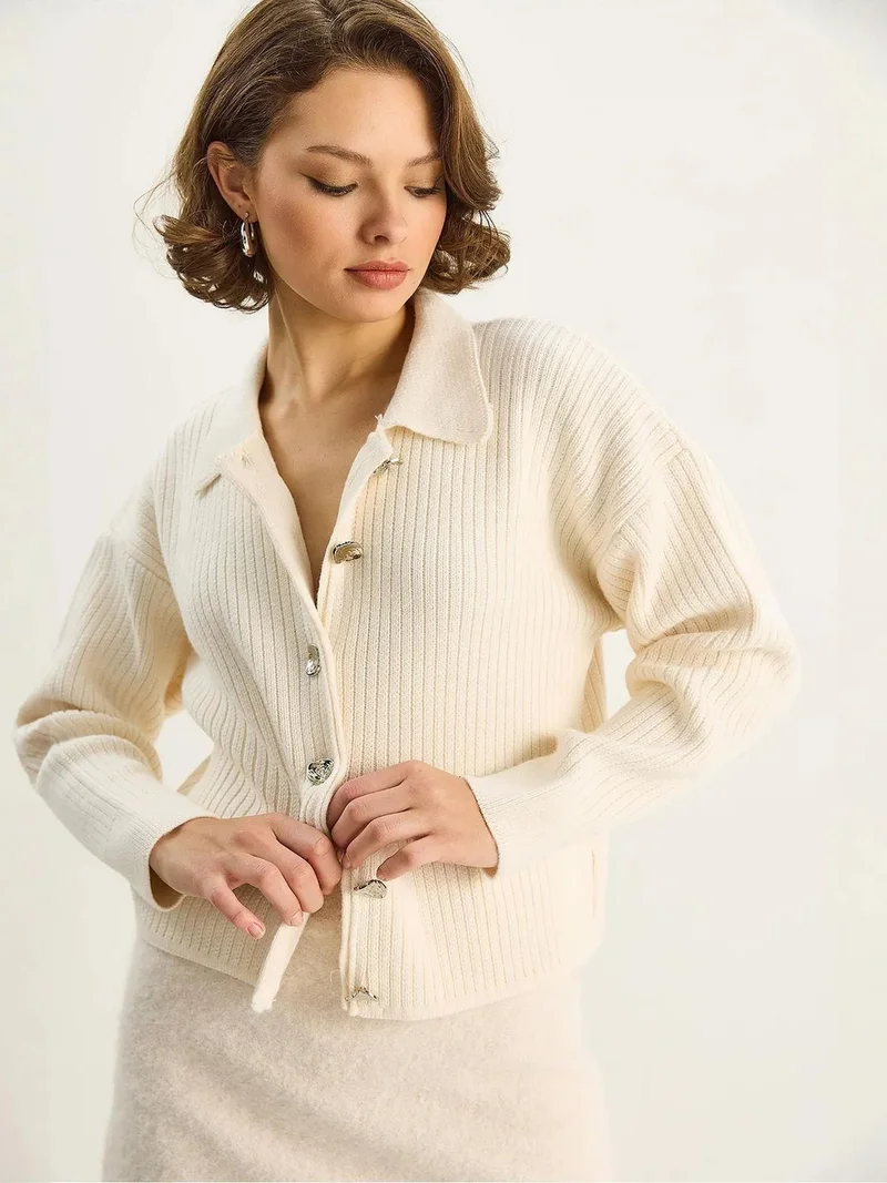 بيانكو لوتشي كارديجان لوكسي محبوك بأزرار