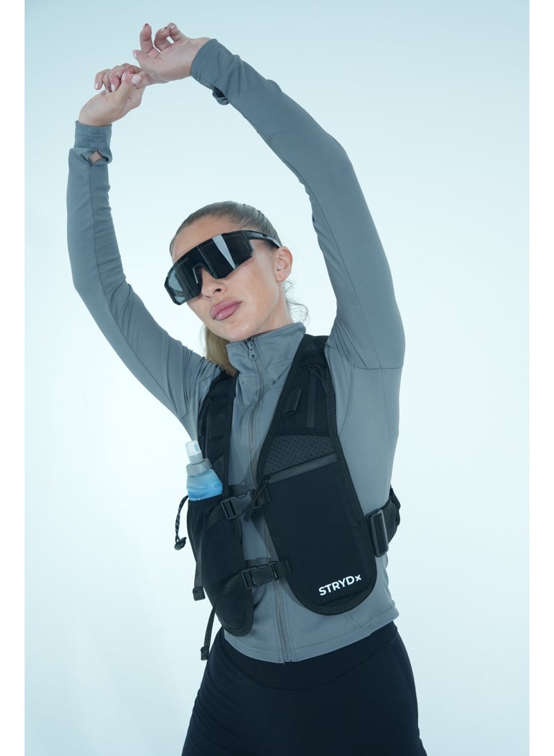 STRYDx Hydration Vest. Stay fueled and focused on your run, hike, or ride with this lightweight hydration vest. Designed for comfort and performance, it features multiple storage pockets for essentials, adjustable straps for a secure fit, and a built-in hydration bladder compartment to keep water easily accessible.   One 500ml Soft Flask included. - Image 1