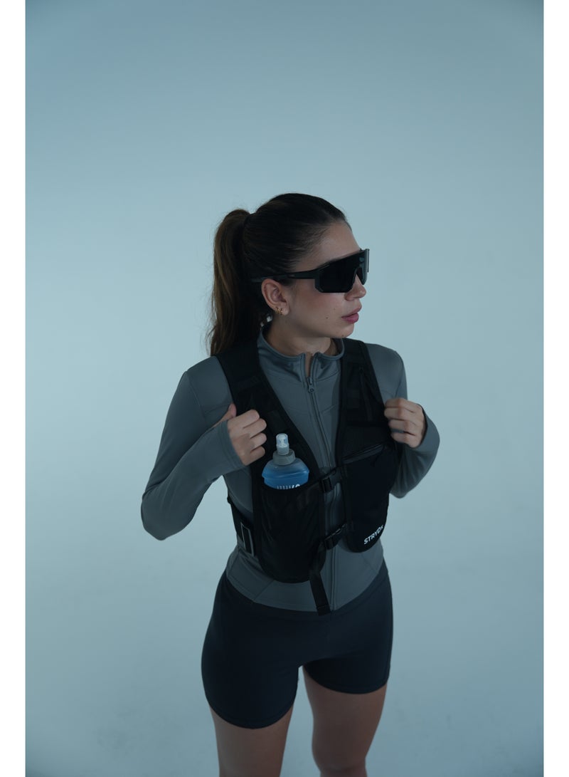 STRYDx Hydration Vest. Stay fueled and focused on your run, hike, or ride with this lightweight hydration vest. Designed for comfort and performance, it features multiple storage pockets for essentials, adjustable straps for a secure fit, and a built-in hydration bladder compartment to keep water easily accessible.   One 500ml Soft Flask included. - Image 3