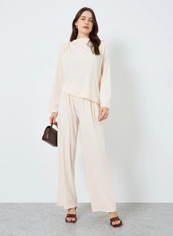 ستايلي طقم بلوزة فضفاضة وبنطلون واسع الساق