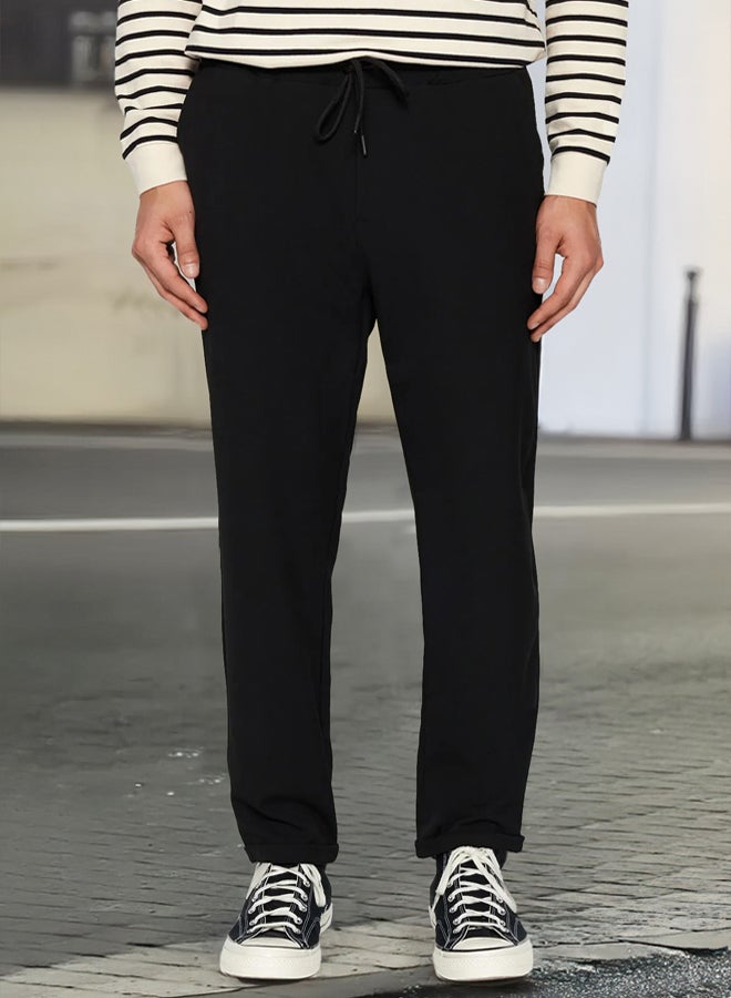 trendyol Black Men's Elastic Waist Slim Fit Trousers - Image 1