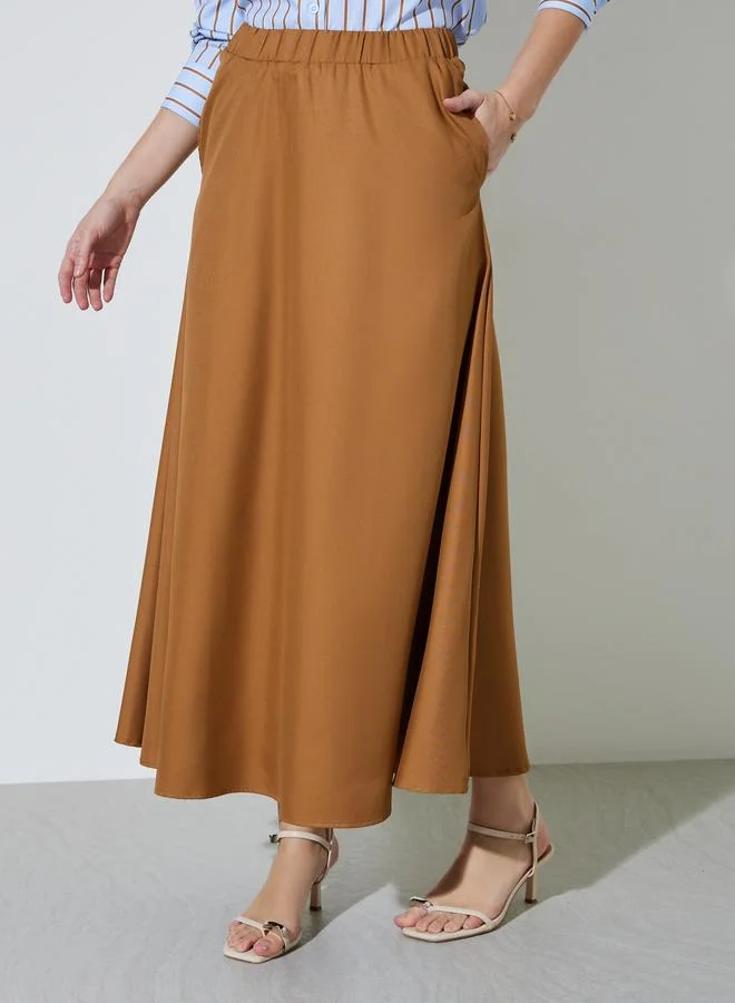 Styli Brown Solid Pocket Detail A-Line Maxi Skirt