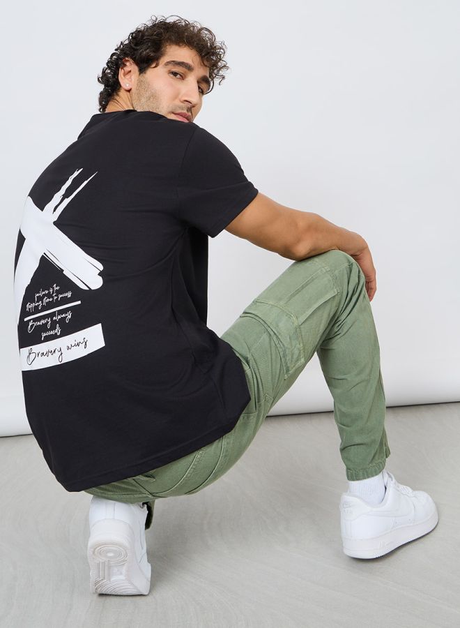 ستايلي تيشيرت بقصة واسعة وطبعة جرافيك - Image 3