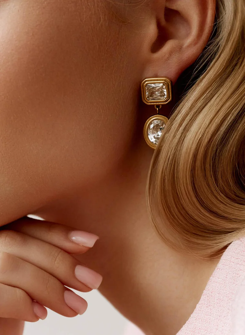 Vintage style golden earrings with large stones