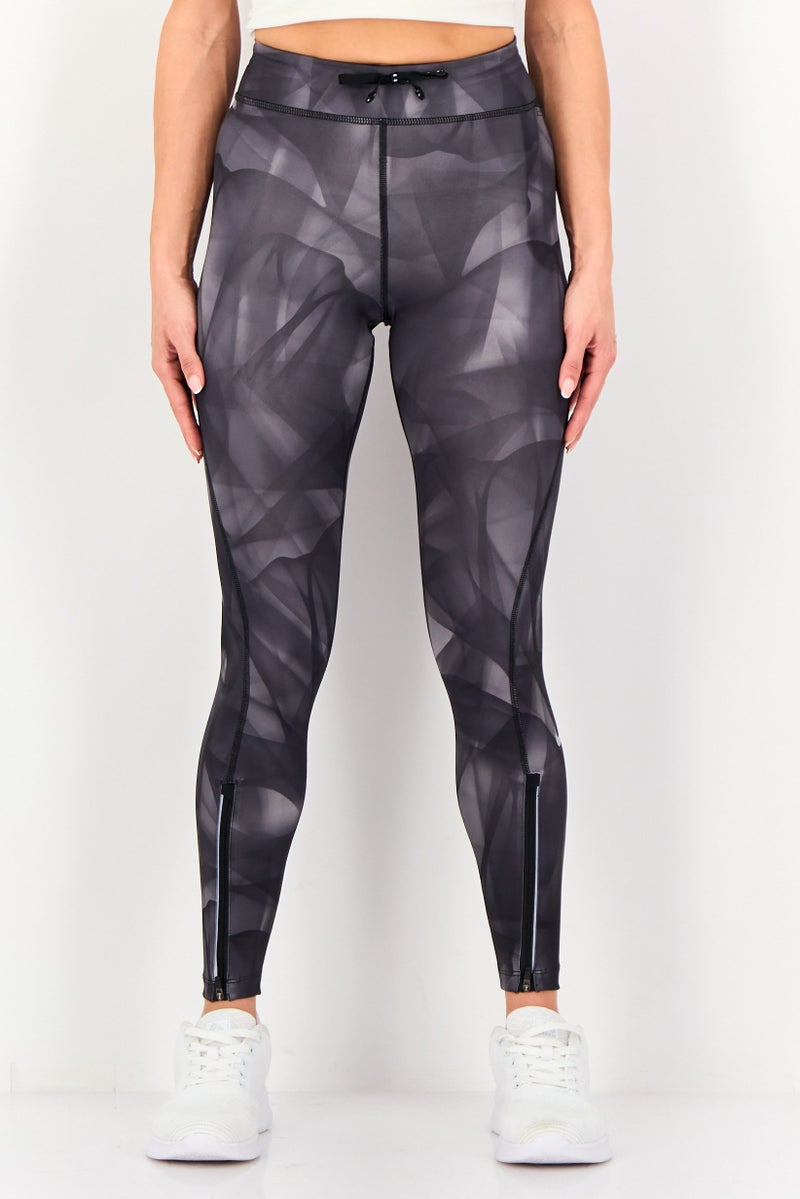 Nike سروال رياضي ضيق 3/4 للنساء بتقنية دري-فيت، متعدد الألوان - Image 1