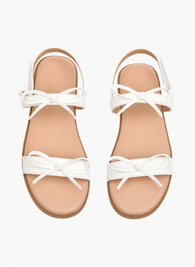 فلورا بيلا من شو إكسبرس Girls Bow Accent Sandals with Hook and Loop Closure