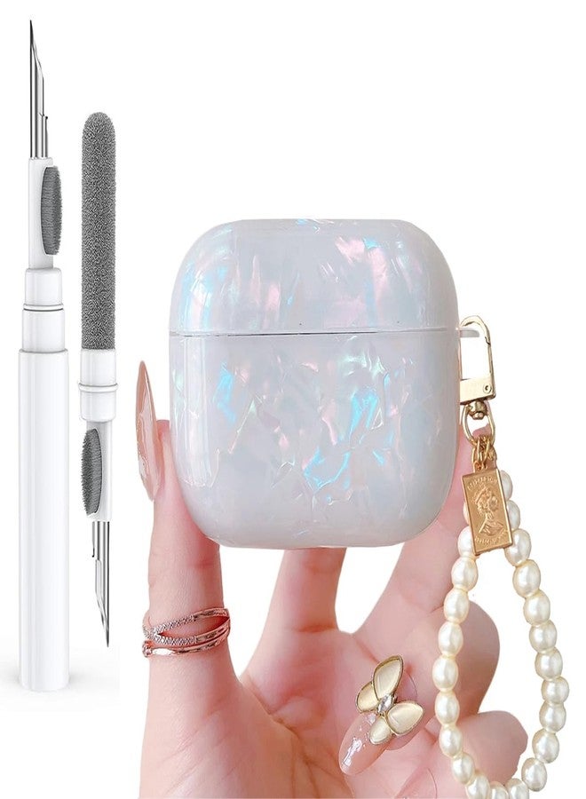 جراب Olytop اللامع واللطيف لسماعات AirPods من الجيل الثالث مع قلم تنظيف، غطاء حماية بتصميم صدفي لسماعات AirPods من الجيل الثالث، مناسب للفتيات والسيدات، مع سلسلة مفاتيح فاخرة من اللؤلؤ لأجهزة Apple iPod من الجيل الثالث - ألوان زاهية - Image 1
