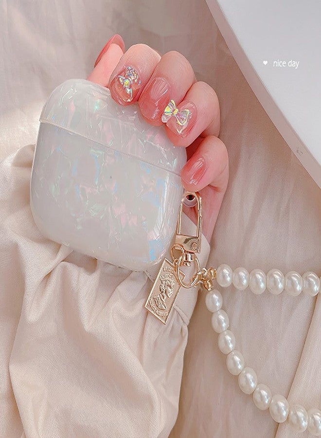 جراب Olytop اللامع واللطيف لسماعات AirPods من الجيل الثالث مع قلم تنظيف، غطاء حماية بتصميم صدفي لسماعات AirPods من الجيل الثالث، مناسب للفتيات والسيدات، مع سلسلة مفاتيح فاخرة من اللؤلؤ لأجهزة Apple iPod من الجيل الثالث - ألوان زاهية - Image 5
