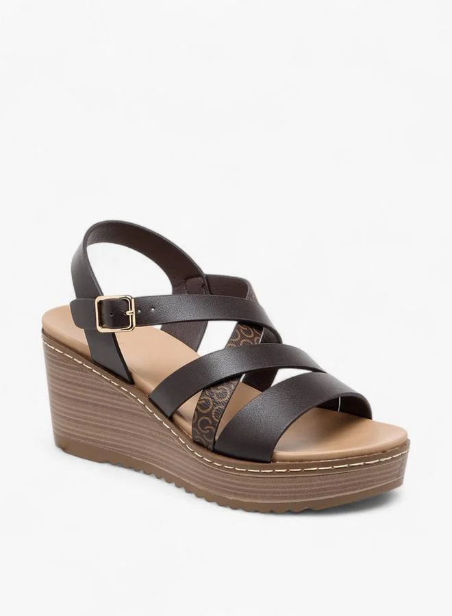 سيليست صنادل نسائية بشعار مطبوع وحزام متقاطع وكعب ويدج