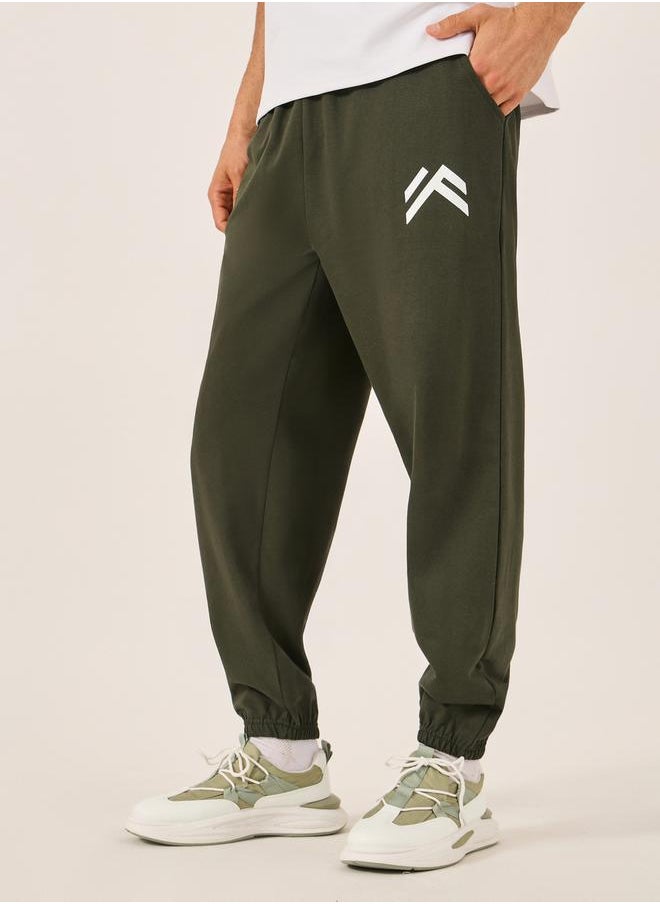 Styli - Mid Rise Oversized Joggers with Minimal Print - Image 1