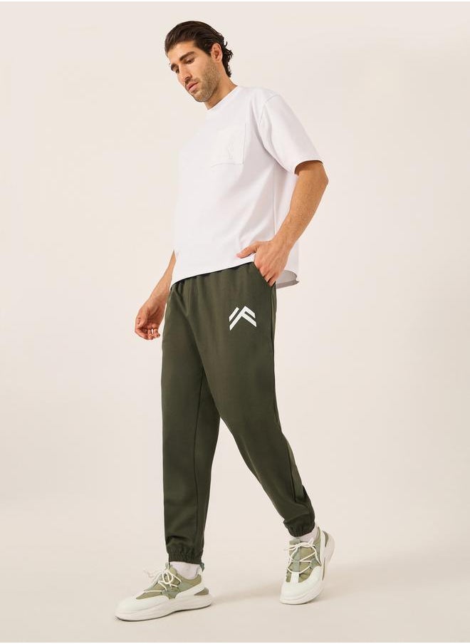 Styli - Mid Rise Oversized Joggers with Minimal Print - Image 1