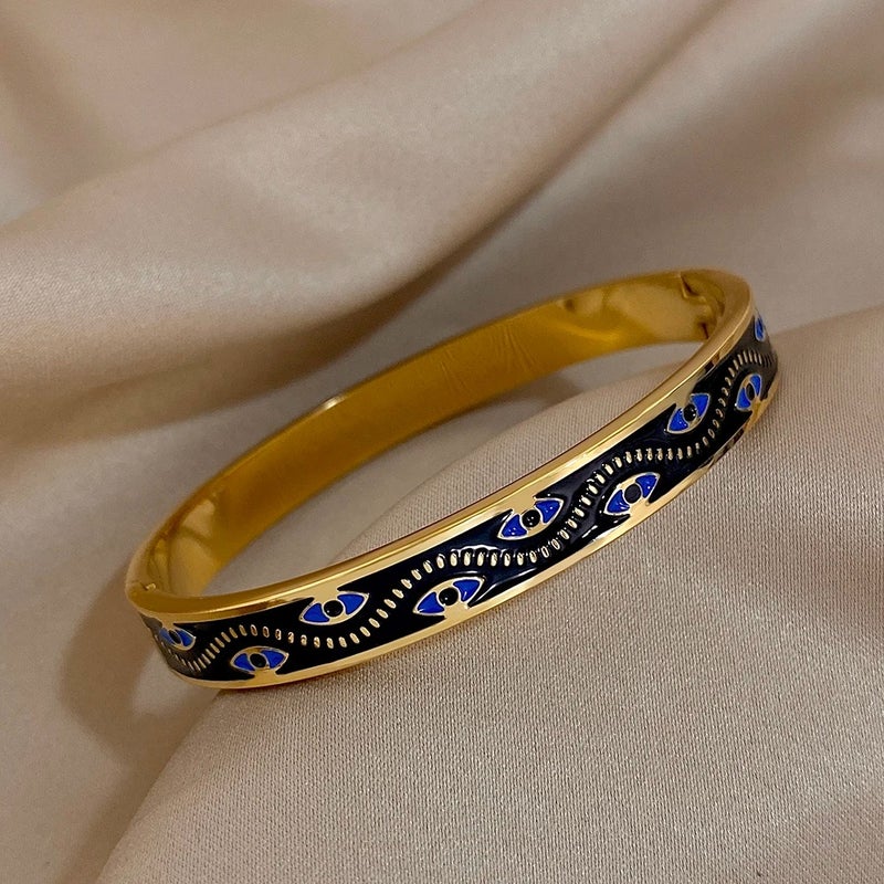 أسورة أستانليس ستيل ذهبي × أسود شكل عين زرقاء - Image 3