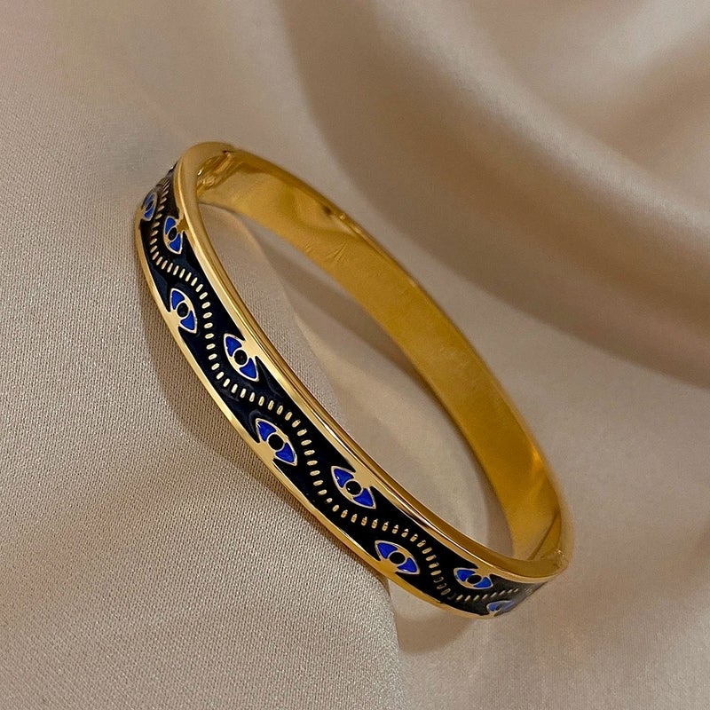 أسورة أستانليس ستيل ذهبي × أسود شكل عين زرقاء - Image 4