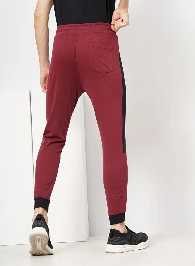 The Indian Garage Co Men Slim Fit Solid Mid-Rise Stretchable Knitted Jogger Trousers