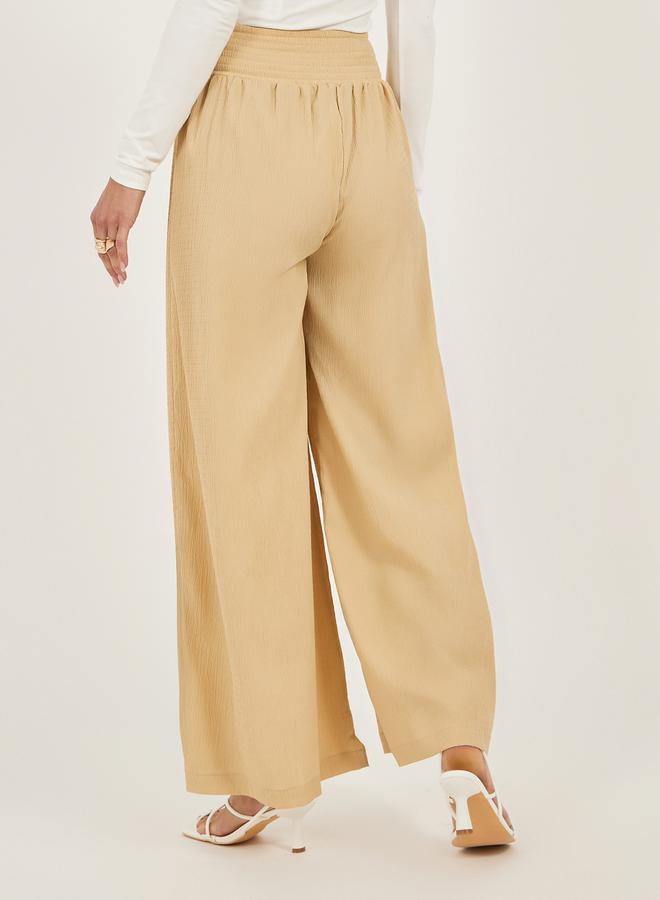 Styli Smocked Waist Mid Rise Wide Leg Pants  - Image 4
