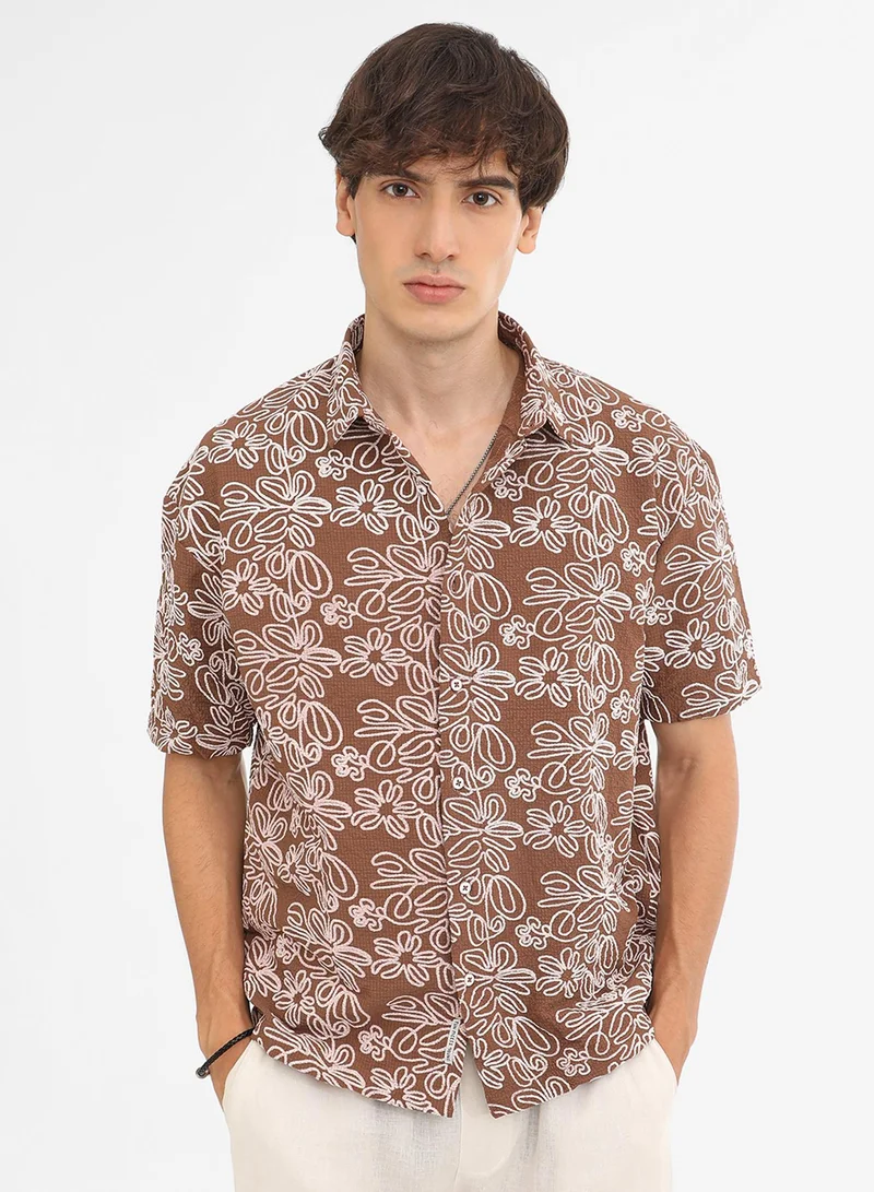 Campus Sutra Campus Sutra Men's Mocha Brown Floral-Lined Oversized Shirt For Casual Wear | Spread Collar | Short Sleeve | Button Closure | Oversized Shirt Crafted With Comfort Fit For Everyday Wear