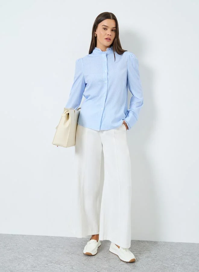 تايك تو بلوزة مخططة بياقة كشكش مع أزرار غلق