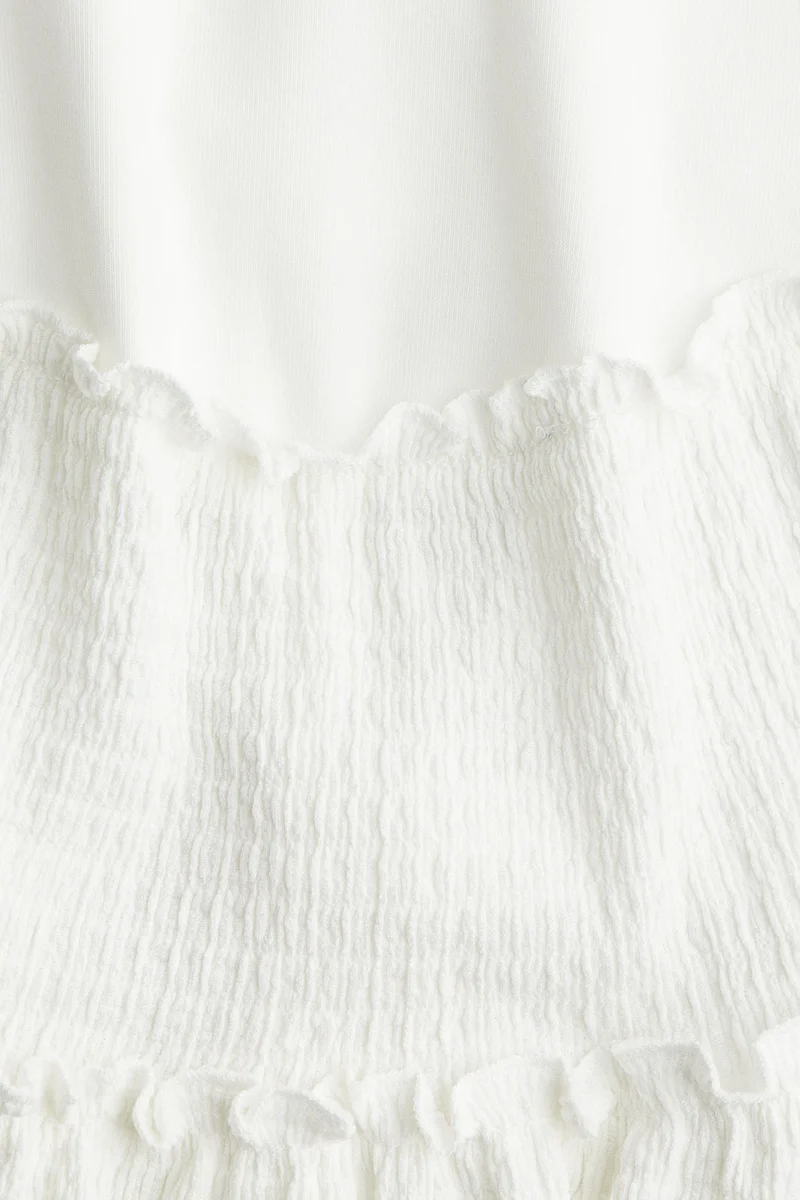 اتش اند ام فستان من الجيرسيه بارز الملمس