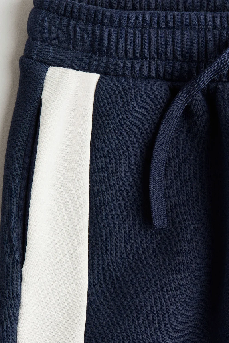 اتش اند ام بنطلون رياضي بألوان متباينة