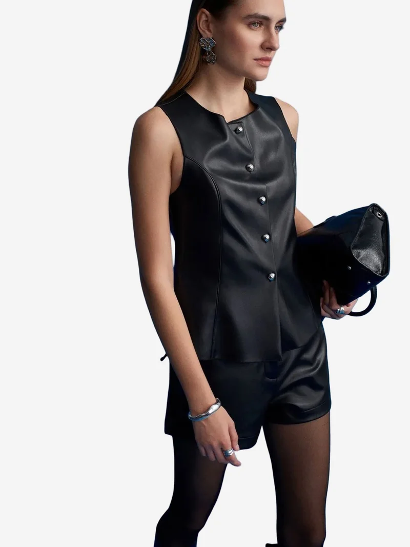 ديلفين DILVIN Mid-Waist Faux Leather Mini Shorts