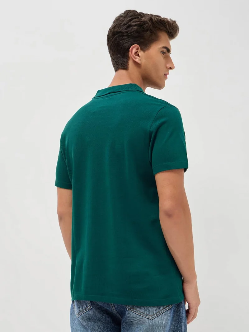 Urbano Fashion  Urbano Fashion Men's Teal Green Solid Regular Fit Half Sleeve Cotton Polo T-Shirt  | Best Price UAE