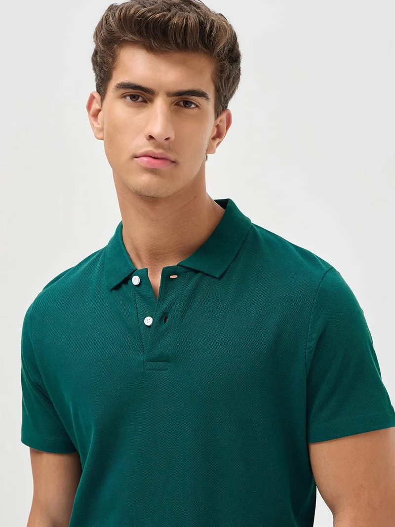 Urbano Fashion  Urbano Fashion Men's Teal Green Solid Regular Fit Half Sleeve Cotton Polo T-Shirt  | Best Price UAE