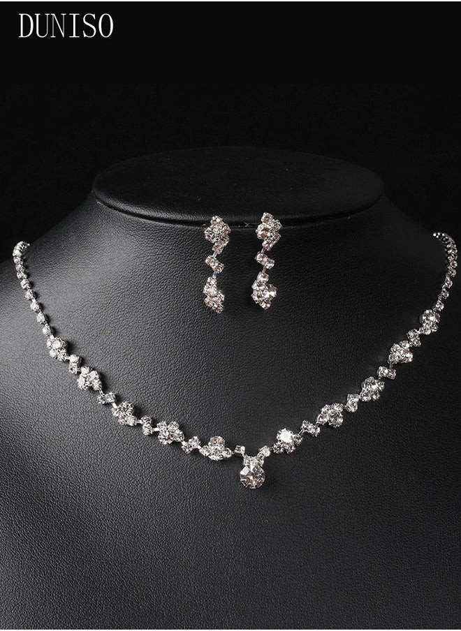 DUNISO - 4 Pcs Silver Rhinestone Jewelry Set for Women Glitter Evening Clutch Envelope Purse Wavy Design Necklace Earrings Bracelet Set for Ladies Dinner Party Date Wedding - Image 1