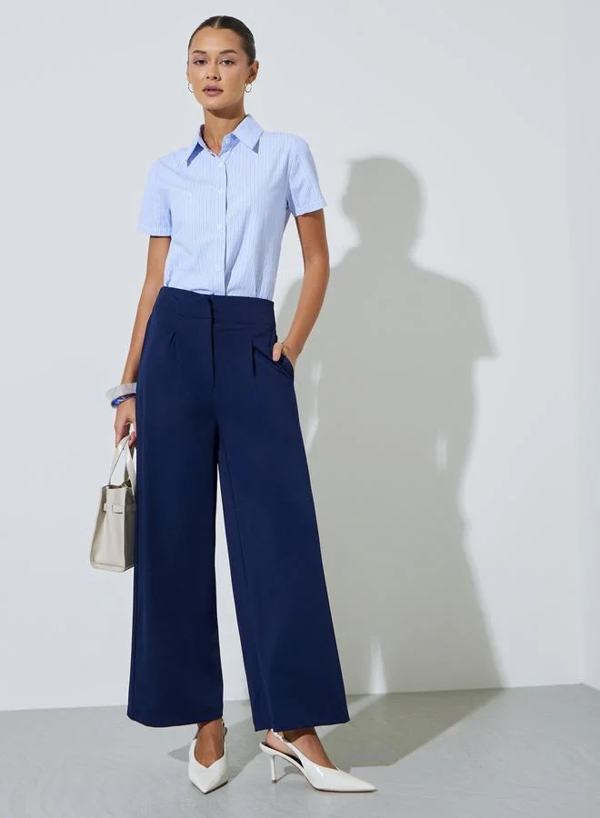 ستايلي Wide-leg ankle-length pants with darts and pleats