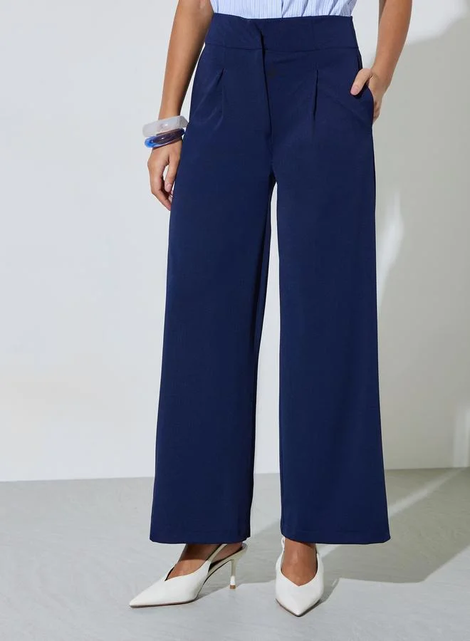 ستايلي Wide-leg ankle-length pants with darts and pleats