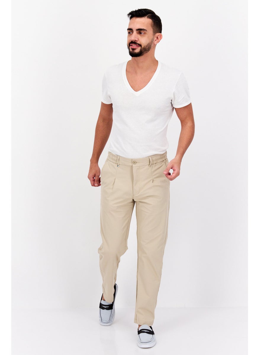 Men Regular Fit Solid Stretchable Straight Leg Pants, Tan - pzsku/ZF413CDE32FFF2A6807B6Z/45/_/1737641988/353ae60f-20db-4947-8282-2dec0d2044d9