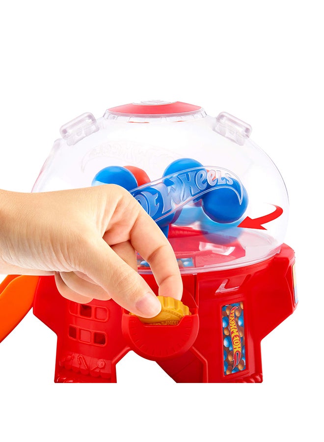 Hot Wheels Toy Car Track Set, Gumball Machine Playset with 1:64 Scale Die-Cast Donut-Shaped Vehicle & Speed Snap Track, Downtown City Candy Shop - Image 4