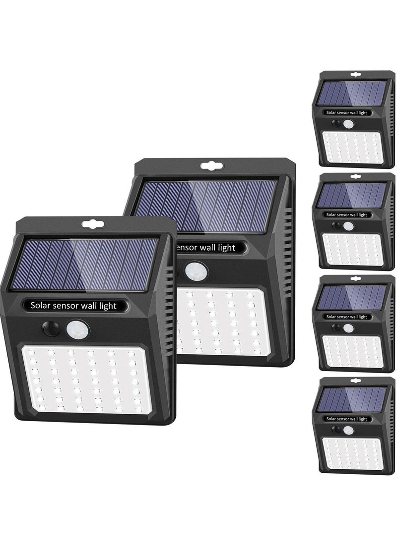 JAJEEK Solar Powered Outdoor Lights [6 Pack] – Wireless Motion Sensor, 42 LEDs, IP65 Waterproof & Dustproof, 3 Adjustable Modes for Garden, Fence, Patio, Garage, Energy Efficient Security Lighting  - Image 1
