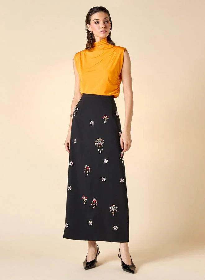 ايكونيك توب بدون أكمام بياقة سلحفاة بقصة مريحة