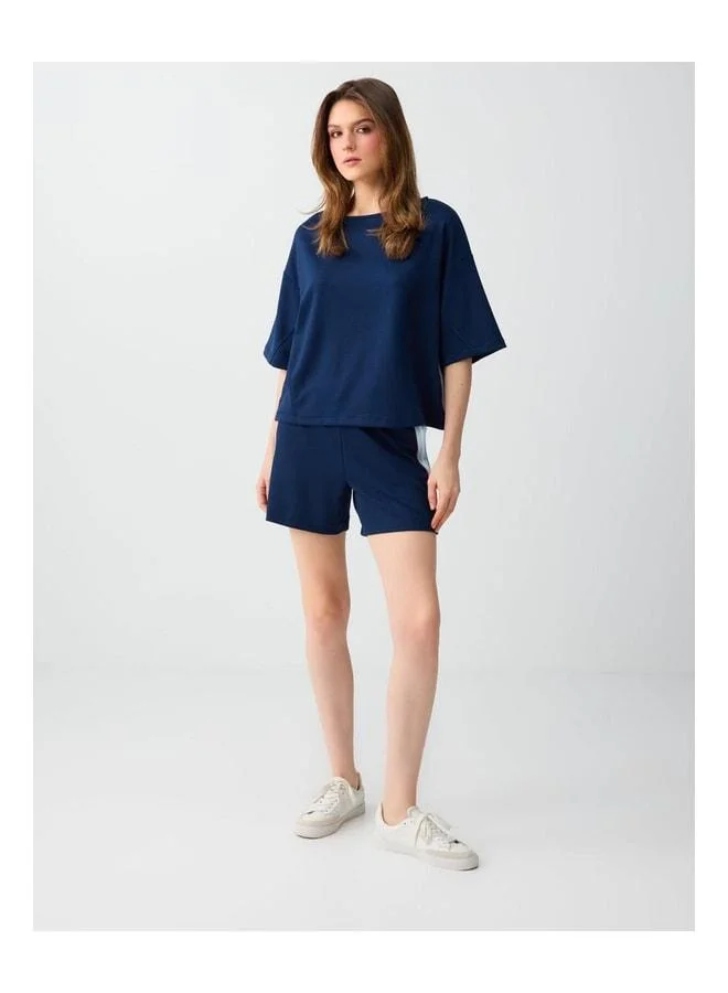 Jimmy Key Navy Comfortable Cut Low-Shoulder Boat Neck Knit Blouse.
