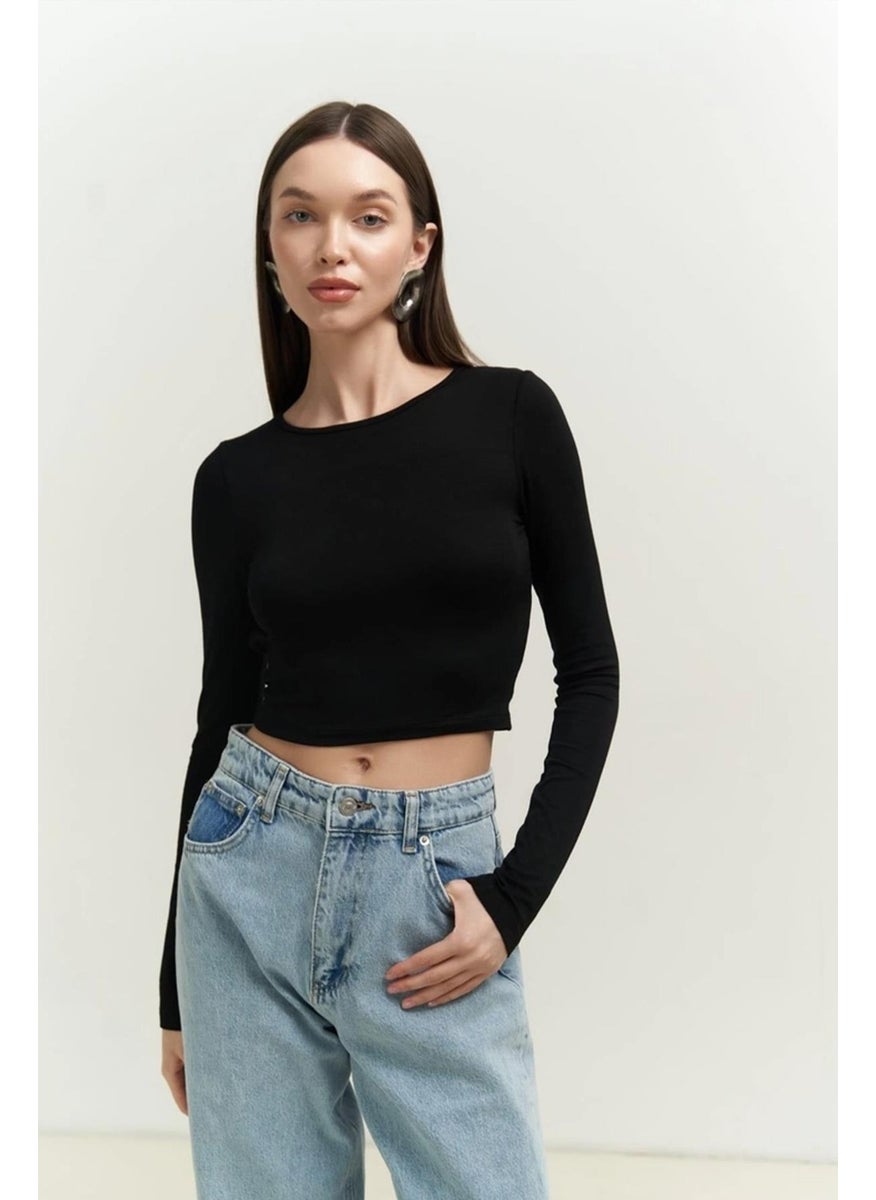 Tena Women's Black Long Sleeve Crew Neck Crop Blouse  - Image 1