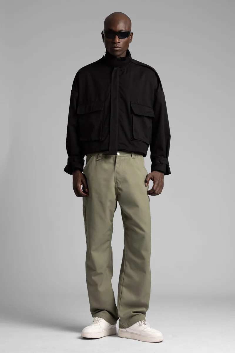 كاتش جاكيت جينز عملي بتفاصيل مخططة